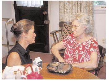 Many elderly people live alone and may have less nutritious diets than those living with a partner. Programs such as Meals On Wheels can help prevent poor nutrition caused by loneliness. [Photo by Ken Hammond. © USDA Photography Center.]