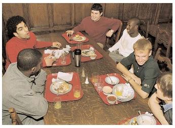 Most universities offer a variety of meal plans. Students who take the time to acquaint themselves with the various foods available around campus, and who strive for nutritional balance, may find their academic performance improves along with their physical health. [AP/Wide World Photos. Reproduced by permission.]